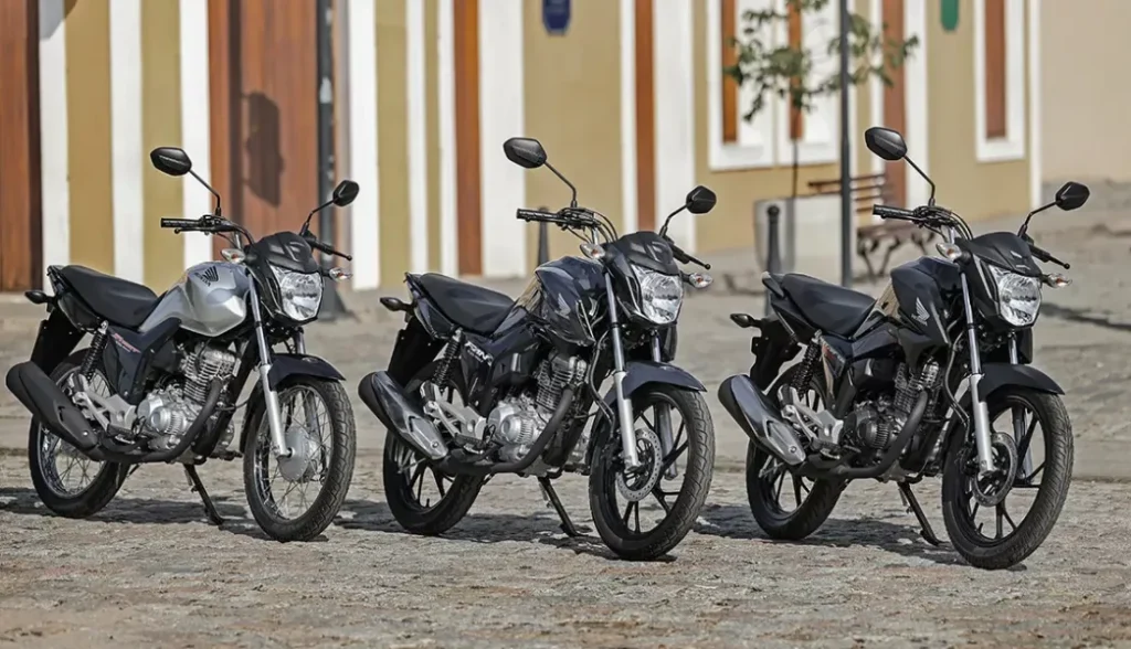 motocicletas honda da nova linha cg 160 2024 start fan e titan na cor preta e estacionadas - Moto Honda Motopel
