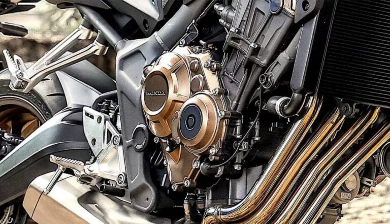 detalhe do sistema escapamento original da motocicleta honda - Moto Honda Motopel