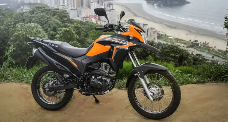 honda xre 190 laranja com praia ao fundo - Moto Honda Motopel